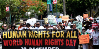 Fiji human rights protesters march through Suva City yesterday