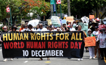 Fiji human rights protesters march through Suva City yesterday