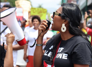 A protester in a "Free Palestine" t-shirt