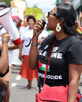 A protester in a "Free Palestine" t-shirt