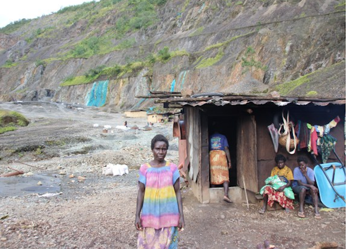 Local residents in the Panguna mine pit 