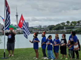 Tamariki raising the West Papuan independence flag Morning Star