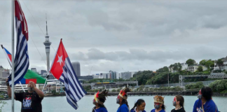 Tamariki raising the West Papuan independence flag Morning Star