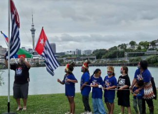 Tamariki raising the West Papuan independence flag Morning Star