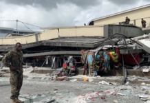 Rescue operations underway on a commercial building flattened by the earthquake in Vanuatu 17 Dec 2024