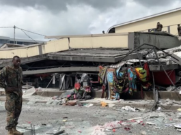 Rescue operations underway on a commercial building flattened by the earthquake in Vanuatu 17 Dec 2024