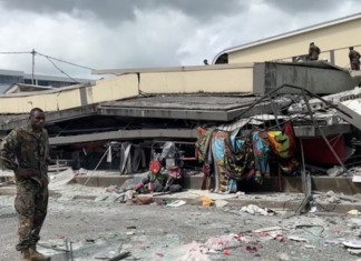 Rescue operations underway on a commercial building flattened by the earthquake in Vanuatu 17 Dec 2024