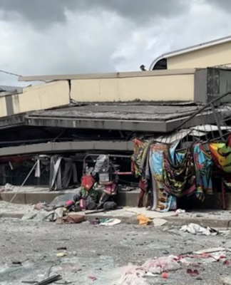 Rescue operations underway on a commercial building flattened by the earthquake in Vanuatu 17 Dec 2024