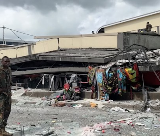 Rescue operations underway on a commercial building flattened by the earthquake in Vanuatu 17 Dec 2024
