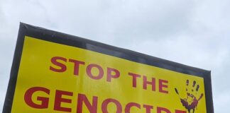 A "Stop the genocide now" placard at Auckland's Te Komititanga Square