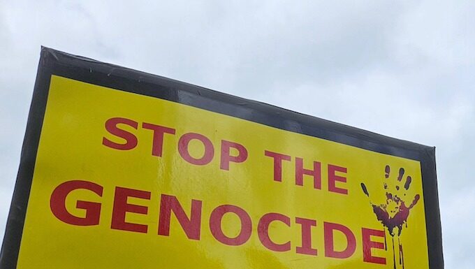 A "Stop the genocide now" placard at Auckland's Te Komititanga Square