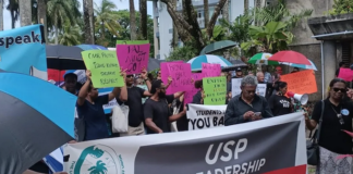 "USP leadership in crisis" banner at an earlier staff protest against the regional Pacific university's management