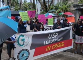 "USP leadership in crisis" banner at an earlier staff protest against the regional Pacific university's management