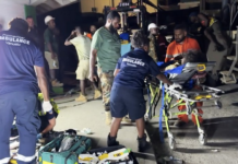 Paramedic teams from ProMedical Vanuatu treat victims of the earthquake in Port Vila on Tuesday