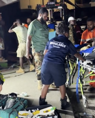 Paramedic teams from ProMedical Vanuatu treat victims of the earthquake in Port Vila on Tuesday