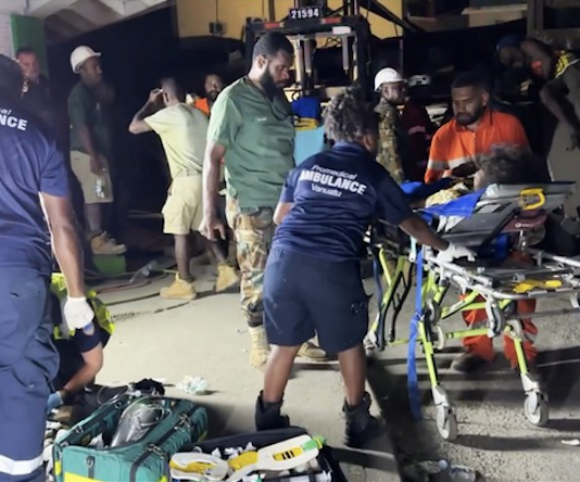 Paramedic teams from ProMedical Vanuatu treat victims of the earthquake in Port Vila on Tuesday