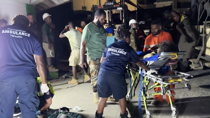 Paramedic teams from ProMedical Vanuatu treat victims of the earthquake in Port Vila on Tuesday
