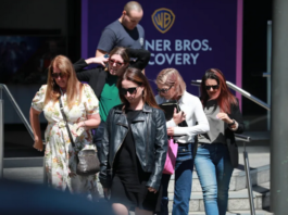 Staff leave the Newshub studio in central Auckland