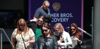 Staff leave the Newshub studio in central Auckland