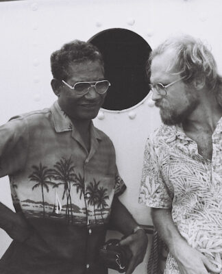 The podcast takes the listener into a room in Seattle, Washington, in 1984, where Greenpeace International leader Steve Sawyer met for the first time with Jeton Anjain