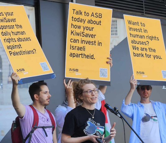 Protesters flag a revived BDS - boycott, divest, sanction - campaign today over the genocidal Israeli war on Gaza