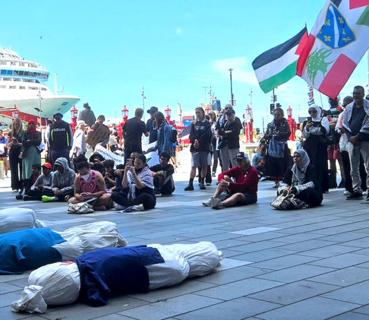 Mock bodies on the pavement in Te Komititanga Square in the heart of Auckland's shopping precinct