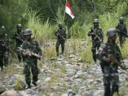 Indonesian military forces on patrol in the Oksop regency