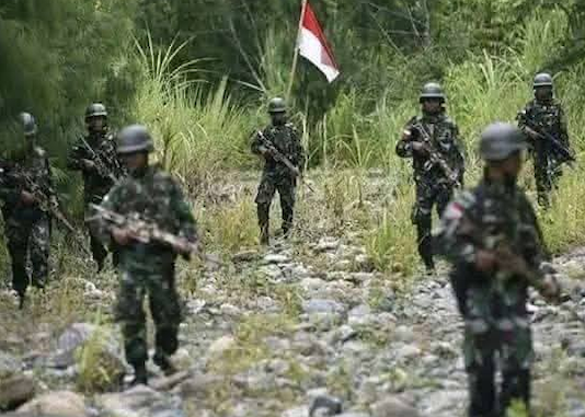 Indonesian military forces on patrol in the Oksop regency