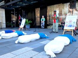 South African activist Achmat Esau speaking out at the New Zealand protest rally in downtown Auckland