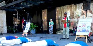 South African activist Achmat Esau speaking out at the New Zealand protest rally in downtown Auckland