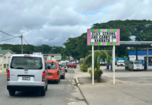 A local business sign in Port Vila reads “Stay strong and carry on Vanuatu”