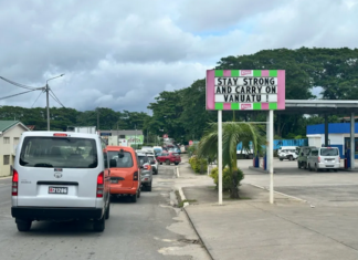 A local business sign in Port Vila reads “Stay strong and carry on Vanuatu”