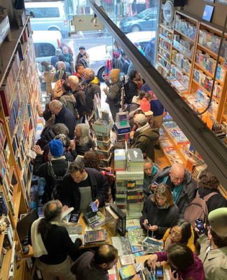 The Educational Bookshop in East Jerusalem is full with shoppers