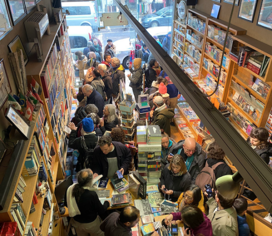 The Educational Bookshop in East Jerusalem is full with shoppers