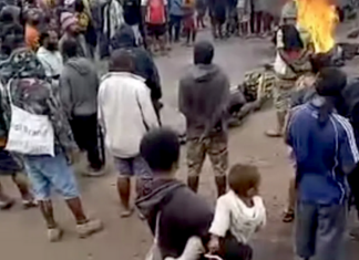 Relatives and supporters protest outside Goroka