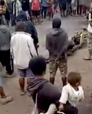 Relatives and supporters protest outside Goroka