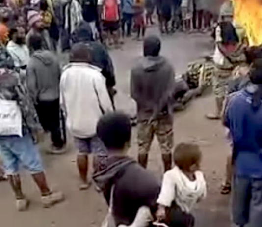 Relatives and supporters protest outside Goroka