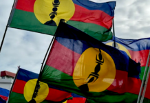 Kanak flags flying high at a pro-independence rally in Nouméa