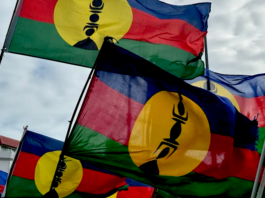 Kanak flags flying high at a pro-independence rally in Nouméa