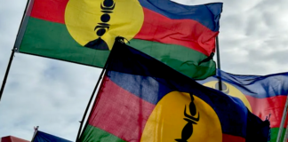 Kanak flags flying high at a pro-independence rally in Nouméa