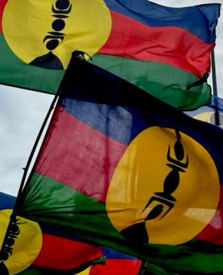 Kanak flags flying high at a pro-independence rally in Nouméa