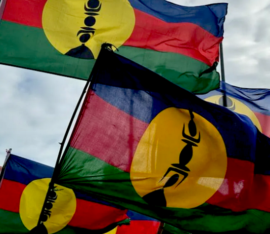 Kanak flags flying high at a pro-independence rally in Nouméa