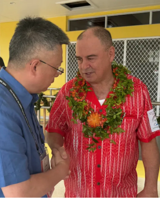 Cook Islands Prime Minister Mark Brown with China's Ambassador to the Pacific Qian Bo