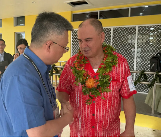 Cook Islands Prime Minister Mark Brown with China's Ambassador to the Pacific Qian Bo