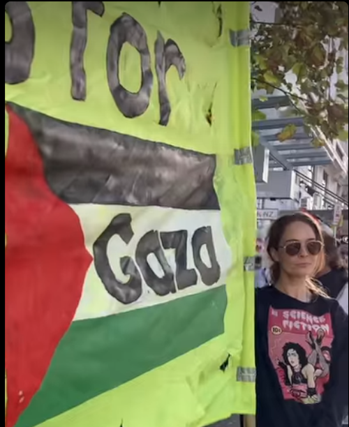 Protesters picket outside the US Consulate in Auckland today in protest against Israel resuming air strikes on Gaza