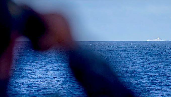 Australia’s defence – navigating US-China tensions in changing world A crew member on board the RAN frigate HMAS Stuart monitors the Chinese Navy's missile destroyer Zunyi and the supply ship Weishanhu