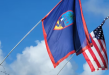 The flags of Guam and the US