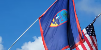 The flags of Guam and the US