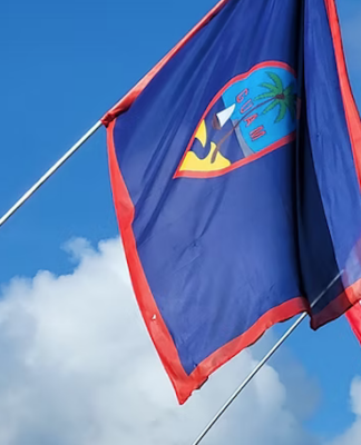 The flags of Guam and the US