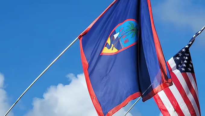 The flags of Guam and the US